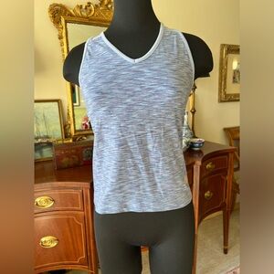 The North Face athletic jog yoga top blue and purple. Size medium runs small.